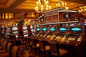 Mobile phone showing Texas Hold'em Bonus betting interface with ante and raise buttons